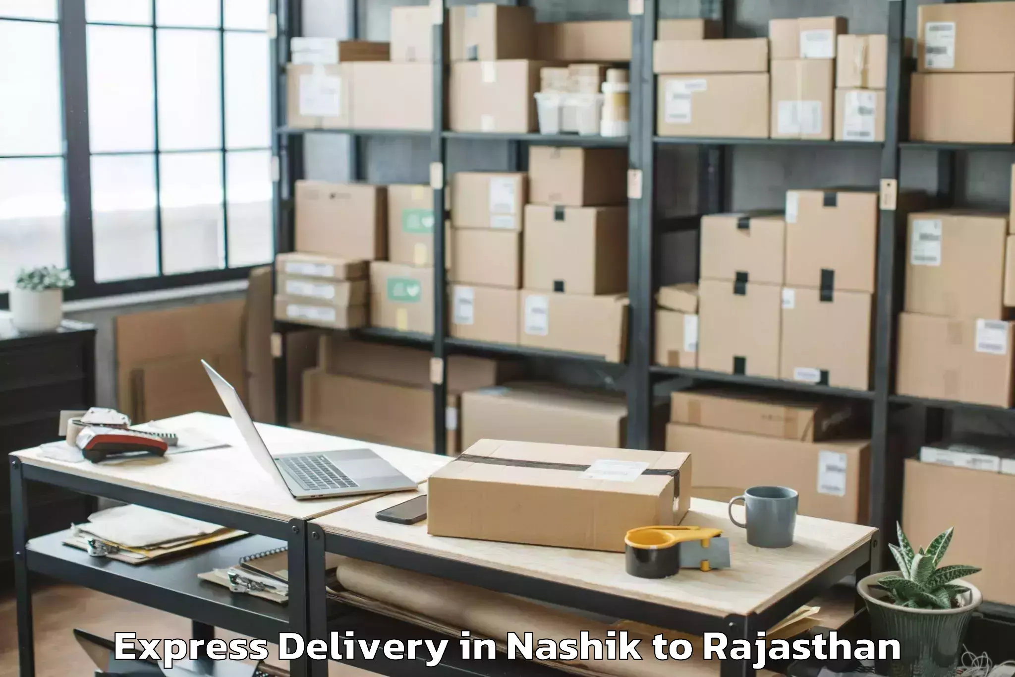 Nashik to Maulana Azad University Jodhpu Express Delivery Booking